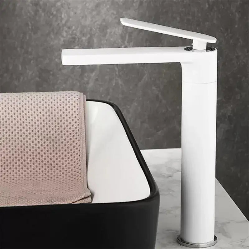 Modern gun gray ceramic basin faucet with sleek minimalist design and tall cylindrical base decorbites gun gray bathroom tap