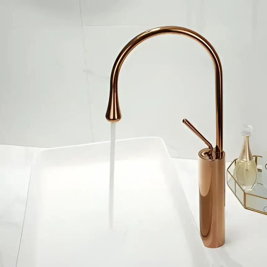 Modern decorbites gun grey brass basin faucet with copper finished sleek curved spout and cylindrical base for kitchen use