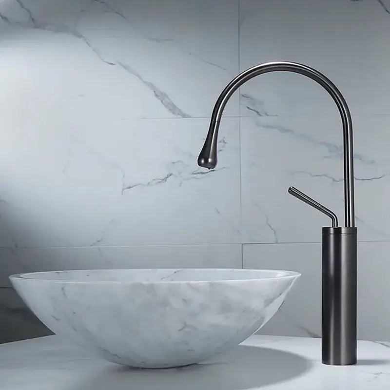 Modern gun grey brass basin faucet by decorbites with a sleek curved matte black swivel spout and cylindrical base
