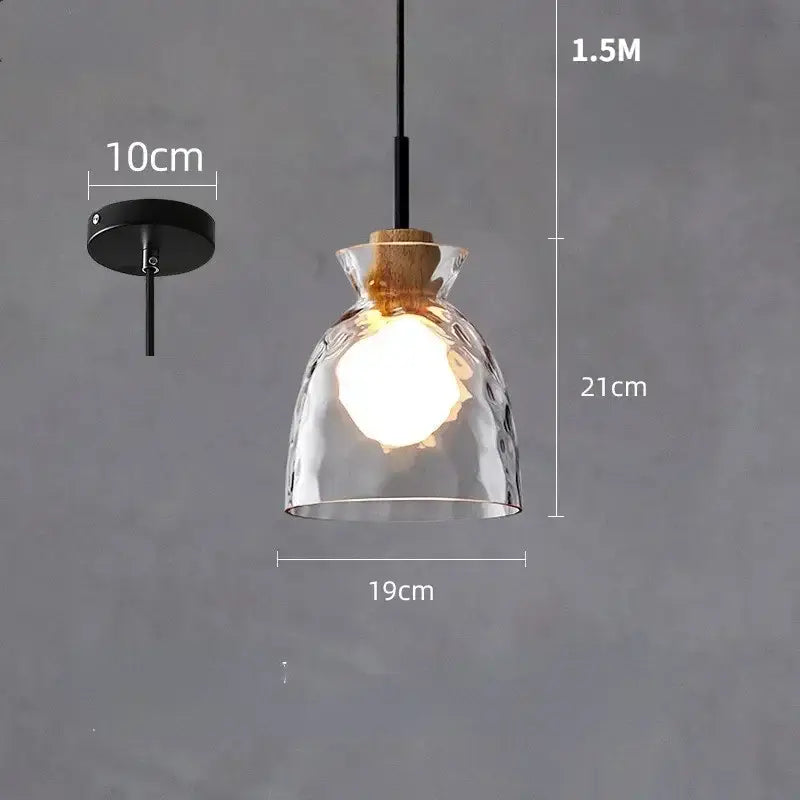 Modern hammered clear glass pendant lamp with textured finish and natural wood cork accent for kitchen decorbites clear glass