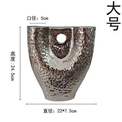 Silver hammered metal planter with textured reflective surface and central opening for decorbites gold vase set decor