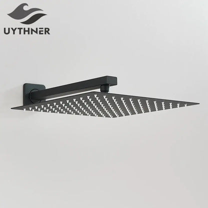 Black matte-finish modern hammered square wall mounted shower head with patterned spray nozzles for bathroom use
