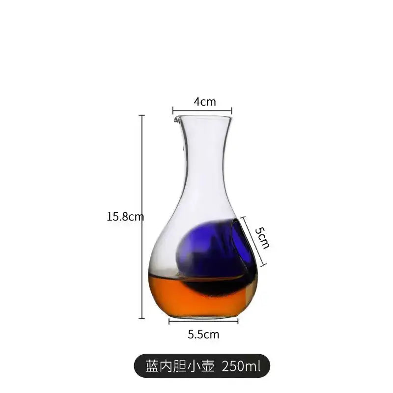 Clear glass wine decanter with blue and amber liquid and 250ml markings from decorbites crystal glass set
