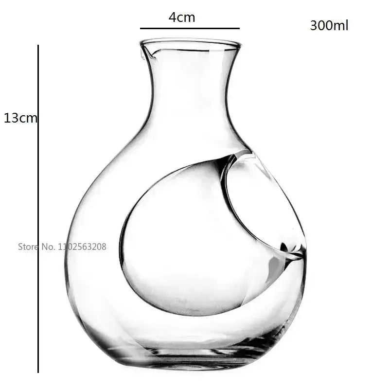 Clear glass wine decanter with sleek modern design and curved spout from decorbites crystal glass set for dining room