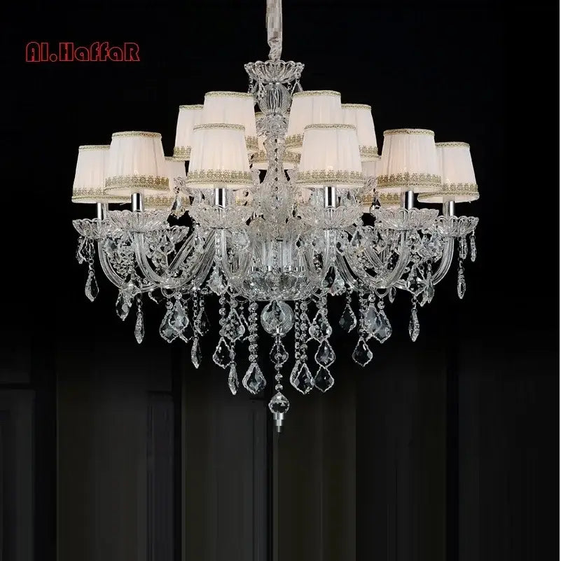 Elegant modern hand blown crystal chandelier light with clear glass droplets and cream lampshades for dining room