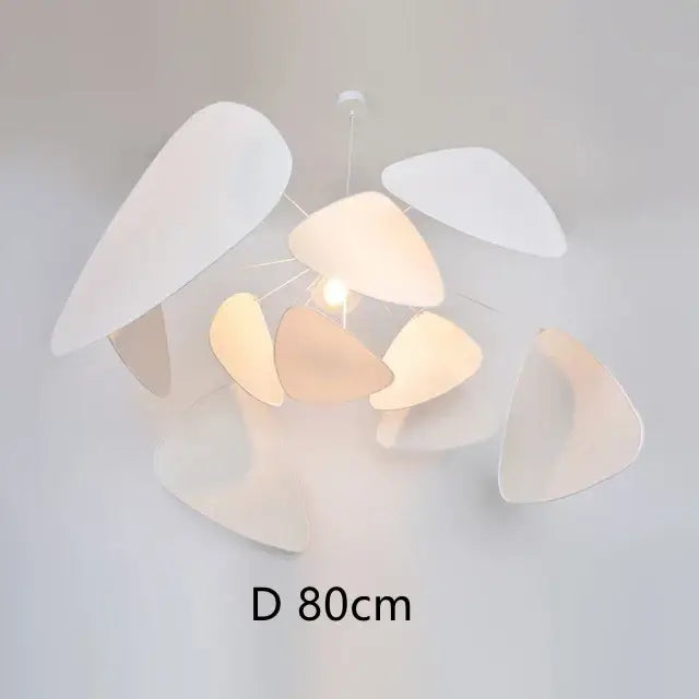 A modern white pendant chandelier hand made with rattan features translucent teardrop panels in a floating design