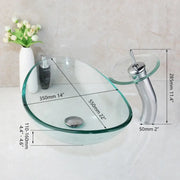 Clear glass vessel sink with sleek modern design and chrome basin mixer faucet for bathroom use