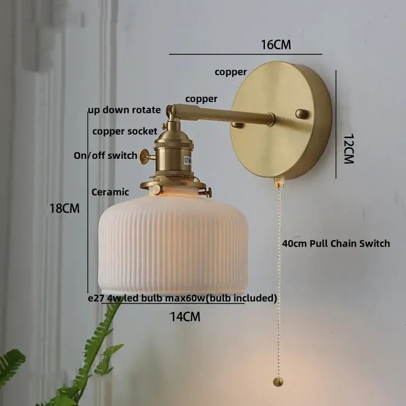 Vintage-style wall lamp with brass-finished copper arm and off-white ribbed ceramic shade decorbites copper led sconce