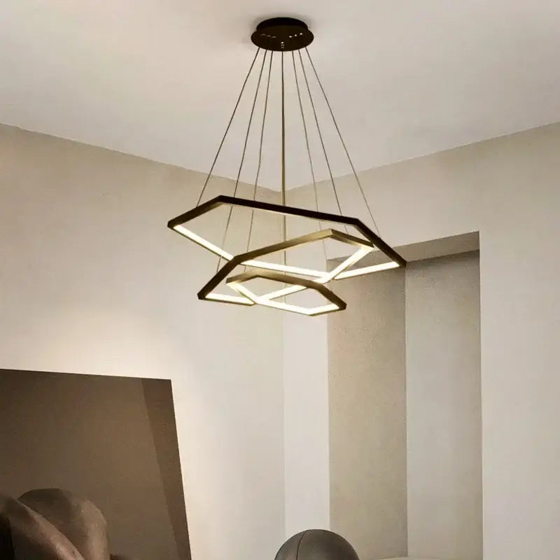 Modern black-framed decorbites hexagon aluminium led pendant light with illuminated geometric shapes for living room decor