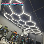 Modern hexagon led ceiling light with sleek white frame and dark gray textured panels decorbites hexagon led fixture