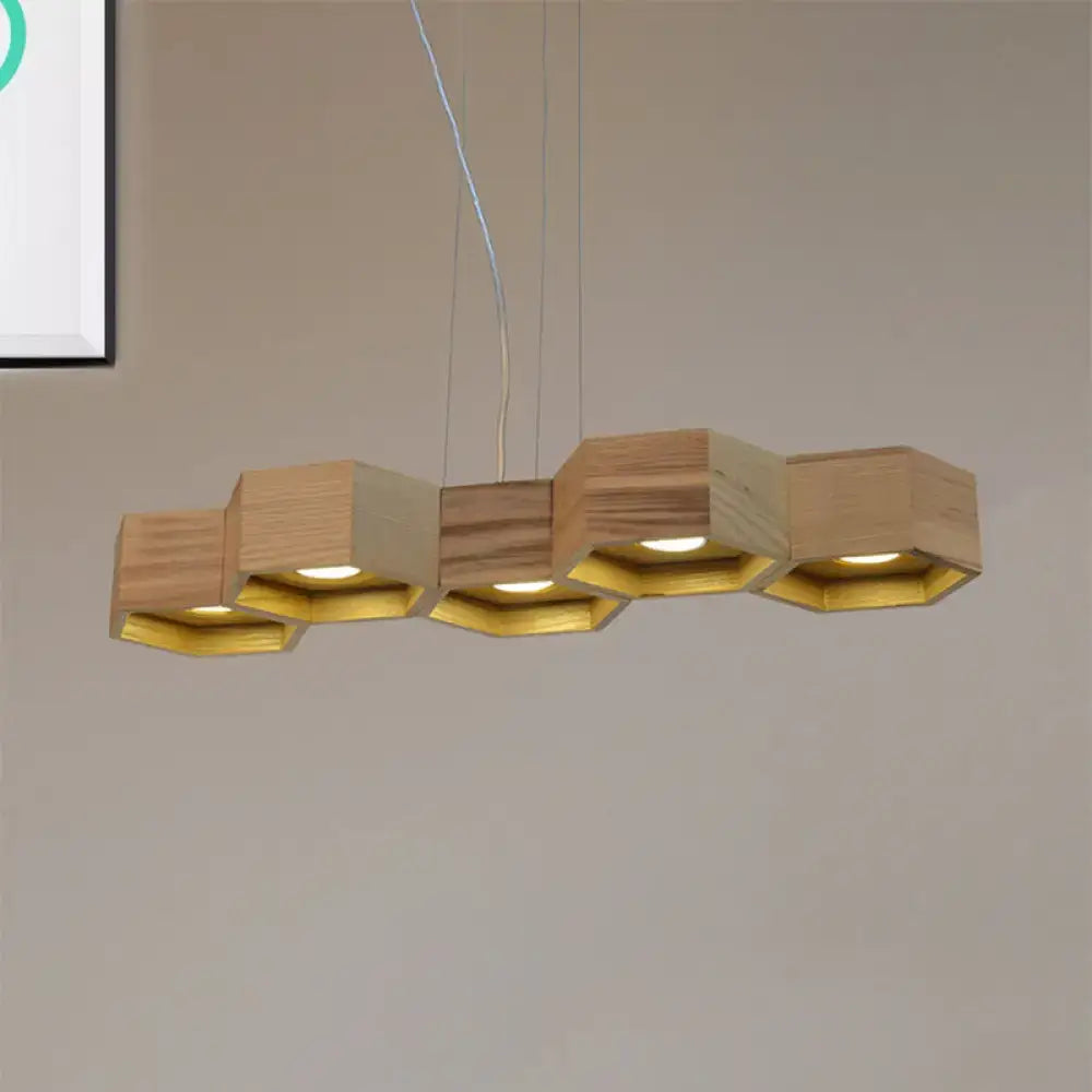 DecorBites modern hexagonal wooden ceiling light fixture with gold interior panels and warm LED island lighting