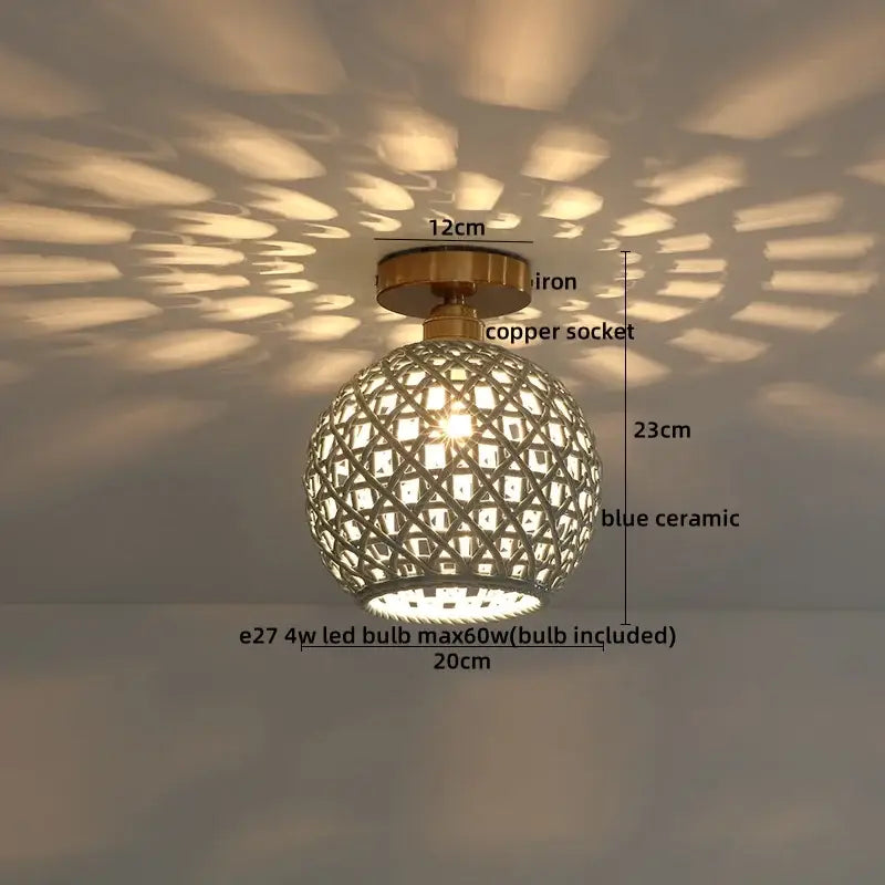 Modern hollow blue and copper decorbites ceramic led ceiling light with intricate lattice design casting geometric shadows