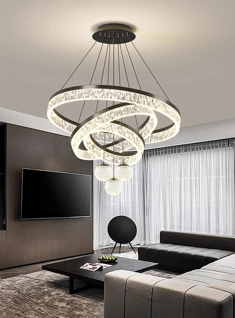 Modern spiral chandelier with clear crystal rings and black metal frame pendant light for living room and dining room decor