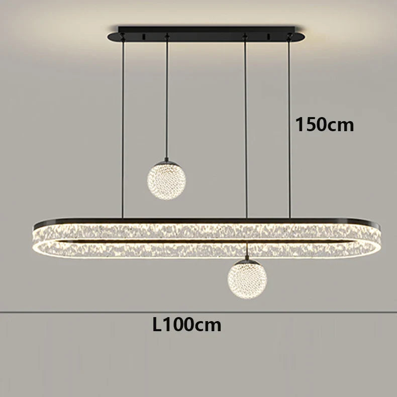 Modern black-framed oval pendant light with crystal edges and two spherical globe fixtures for indoor living room decor