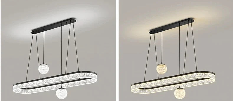 Modern black metal chandelier with oval frame encrusted in clear crystal beads and two spherical glass globe led lights