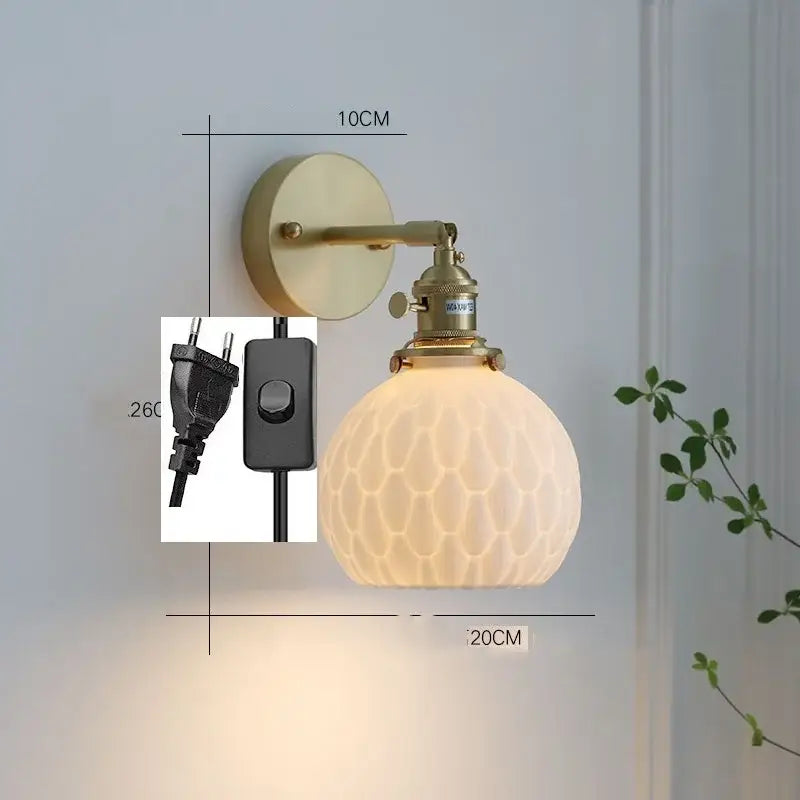 Modern honeycomb brass ceramic led wall sconce with frosted glass shade featuring intricate honeycomb pattern decorbites ceramic led