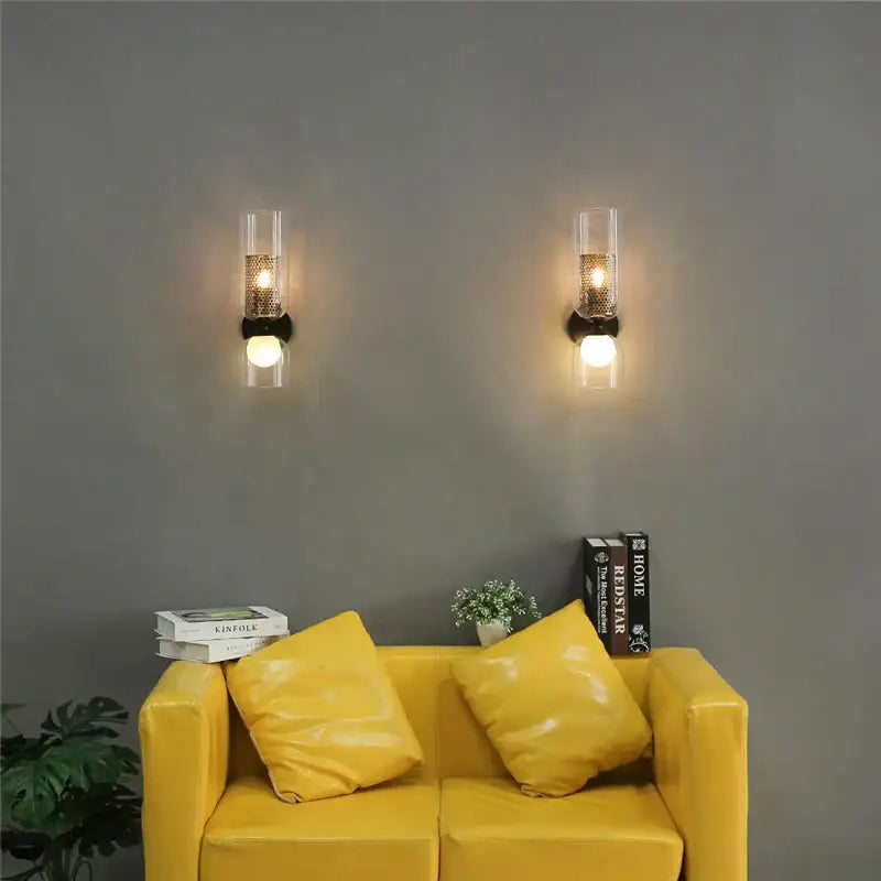 Modern honeycomb glass double headed led wall lamp with clear glass, brass mesh, and black mounting hardware decorbites double headed