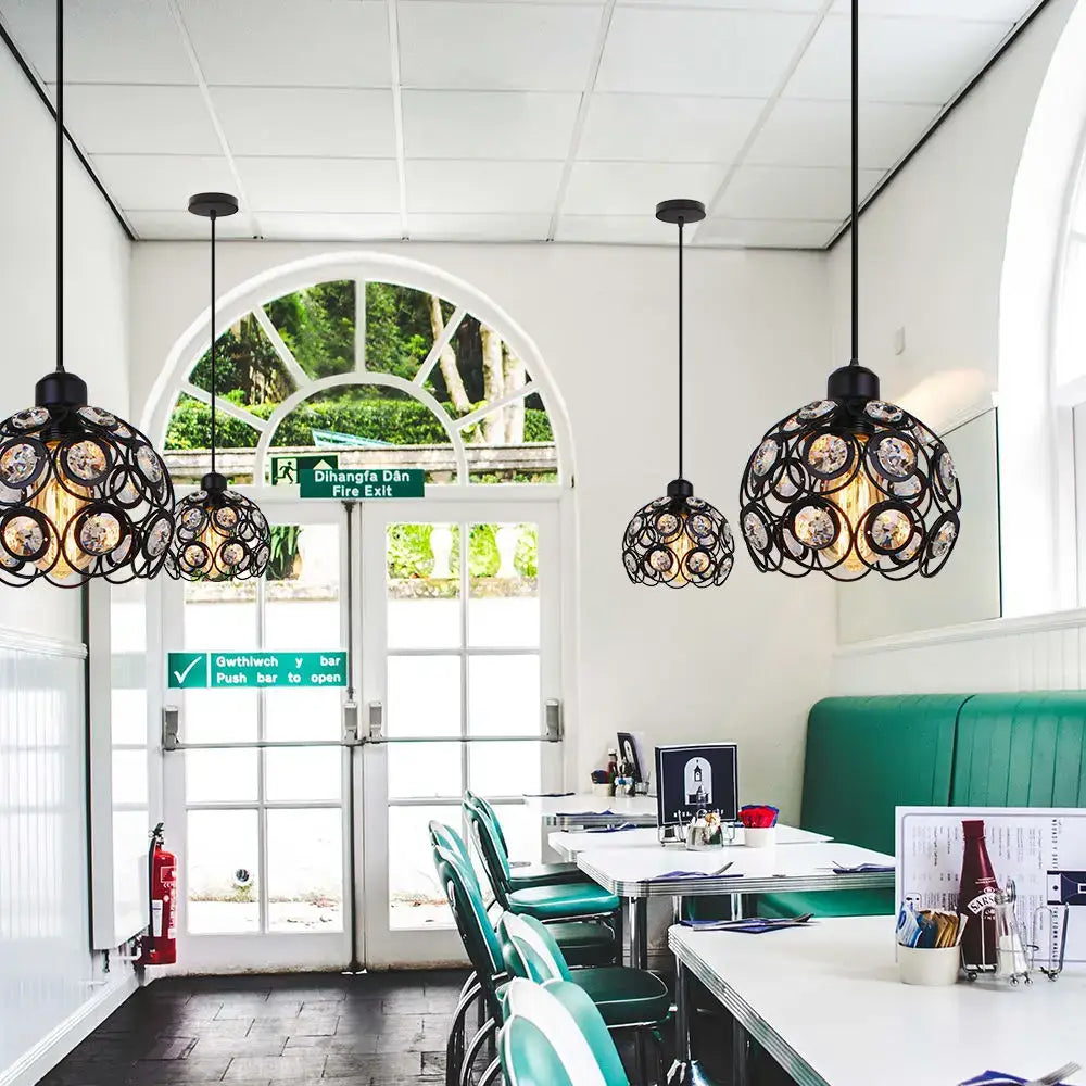 Black wrought iron modern industrial pendant lamp with intricate circular design and warm bulbs for kitchen island decorbites crystal k9 pendant