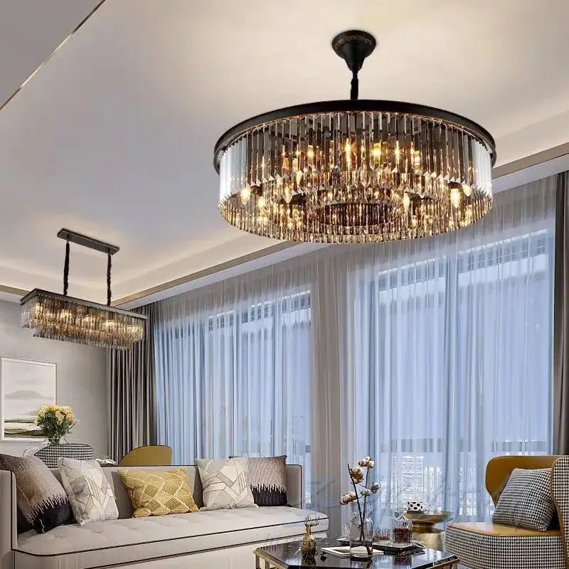 A modern industrial black decorbites crystal ceiling chandelier with cascading clear crystal prisms for dining room