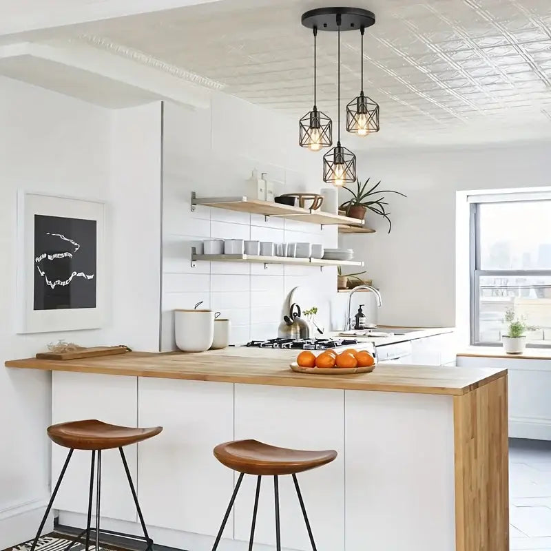 Black metal finish pendant chandelier with cage lights and warm bulb illumination for dining room lighting