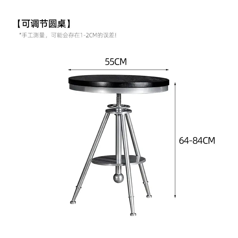 Adjustable round table with black solid wood top and silver iron art legs featuring adjustable height for dining chair use