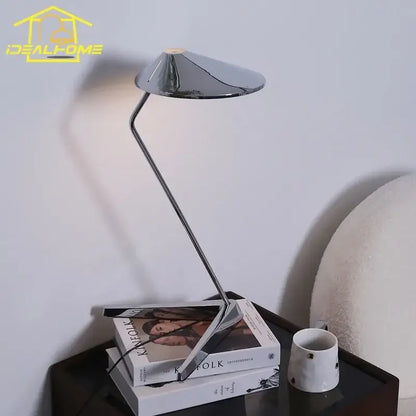 Modern industrial chrome floor lamp with sleek angular design and conical shade for decorbites iron art decorative use