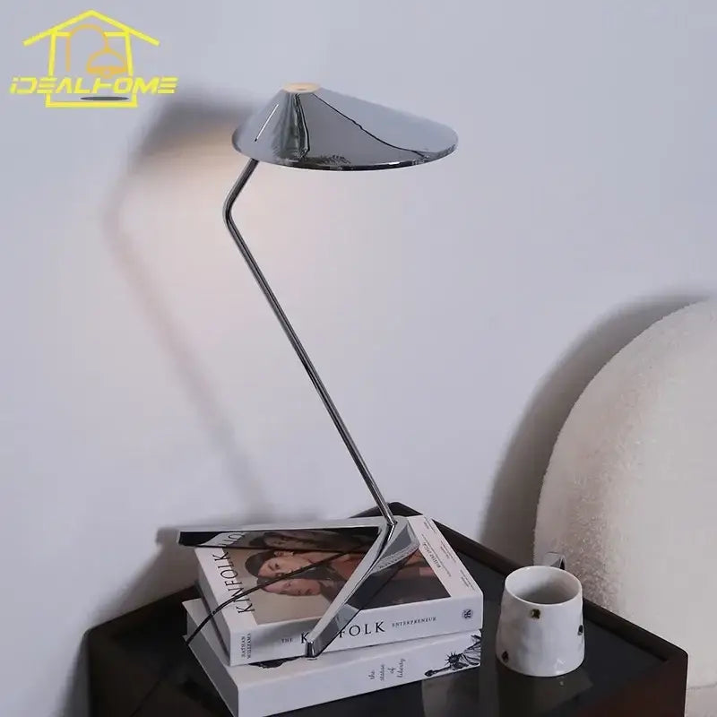 Modern industrial chrome floor lamp with sleek angular design and conical shade for decorbites iron art decorative use
