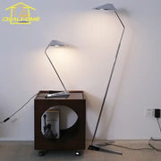 Modern chrome floor lamp with sleek angular design and adjustable arm for decorbites iron art decorative living room use