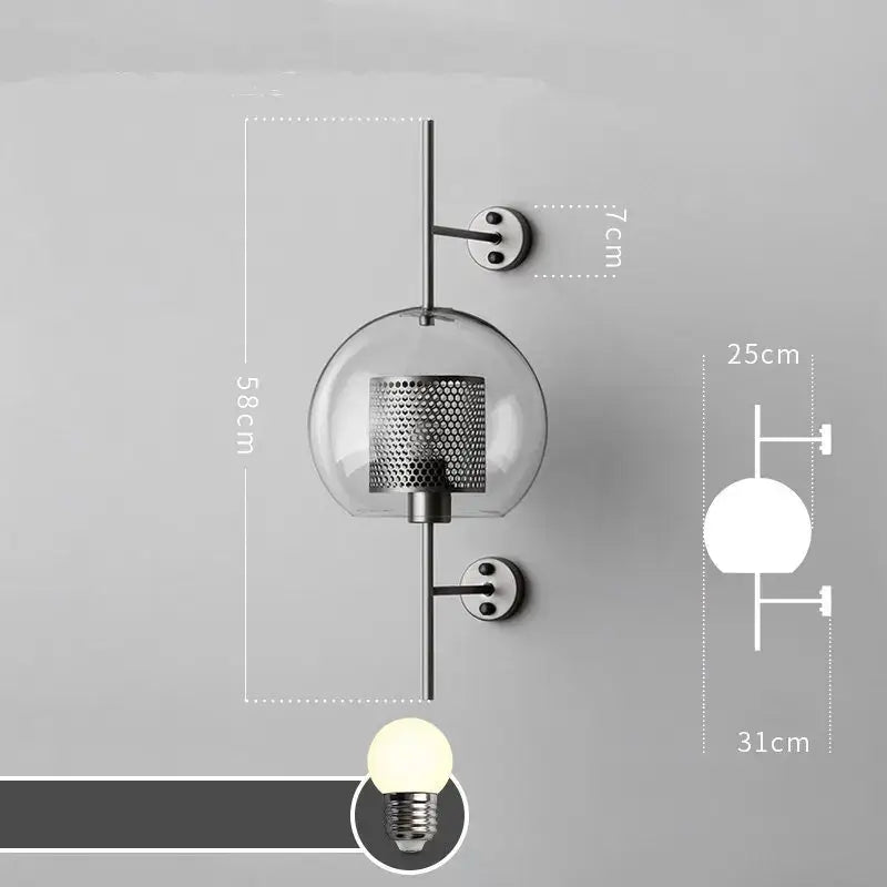 Modern industrial chrome glass wall light with clear glass globe and perforated metal shade on black rod for decorbites wall lights