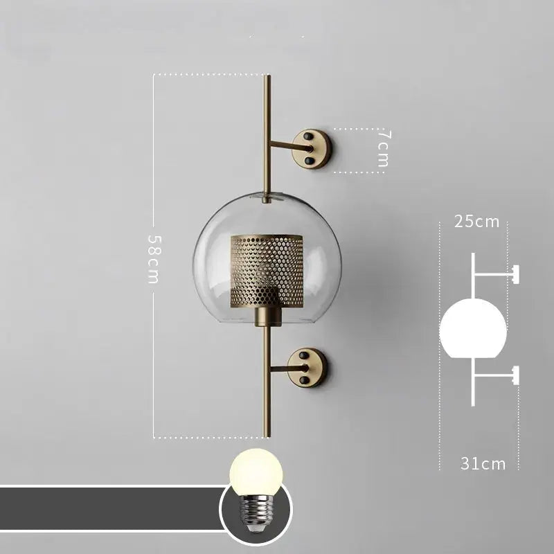 Modern industrial chrome glass wall lights featuring brass-finished wall sconce with clear globe and perforated shade
