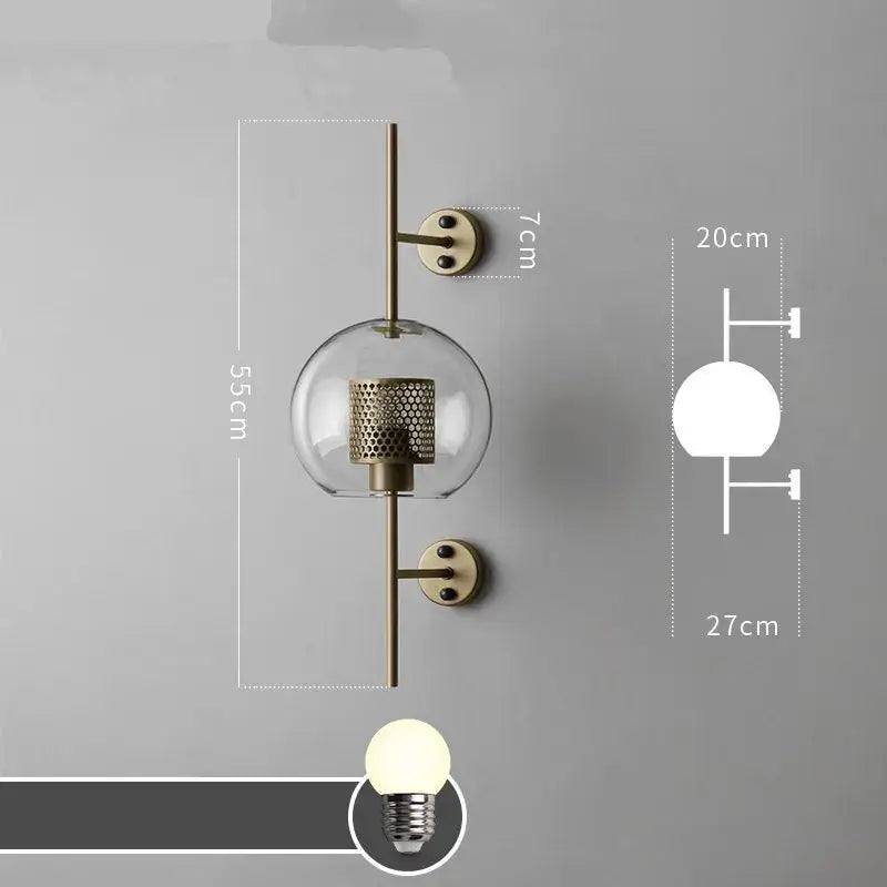 Brass-finished modern industrial chrome glass wall light with clear globe and perforated metal shade for living room decorbites glass industrial wall