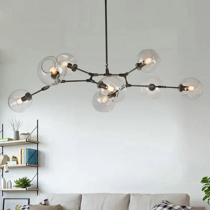 Modern black metal decorbites industrial globe chandelier with clear glass globe shades and exposed bulbs for dining room lighting