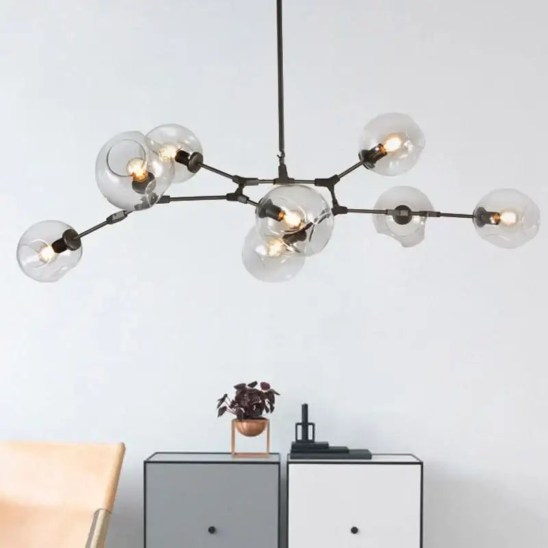 Modern black metal globe glass chandelier with clear bulbs for dining room decorbites industrial globe light