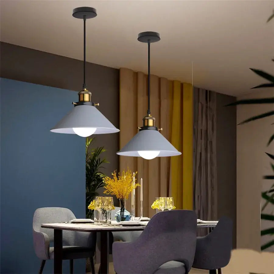 Two matching industrial gray pendant lights with matte gray shades and brass accents for living room decorbites industrial gray
