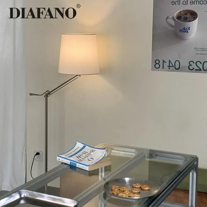 A sleek modern industrial metallic floor lamp with soft beige fabric shade for living room decorbites adjustable led floor