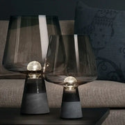 Modern industrial table lamp with dark smoked glass shades and leimu cement bases featuring glowing bulbs for bedroom decorbites leimu cement table