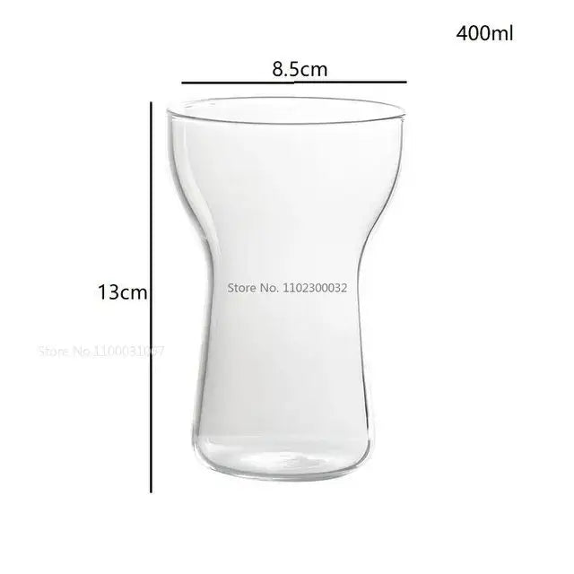 Clear glass drink cup with sleek hourglass shape and smooth edges from the modern insulated drink cup set by decorbites glass drink
