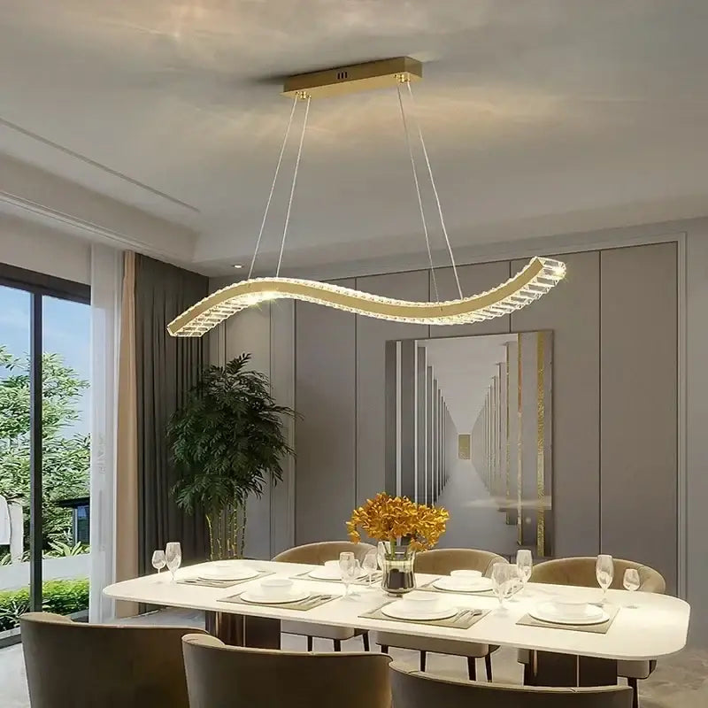 Modern interlocking crystal led ceiling chandelier with gold-toned curved design and decorbites crystal led accents
