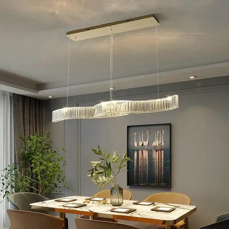 Modern interlocking decorbites crystal led ceiling chandelier with gold frame and cascading clear crystal prisms for dining room