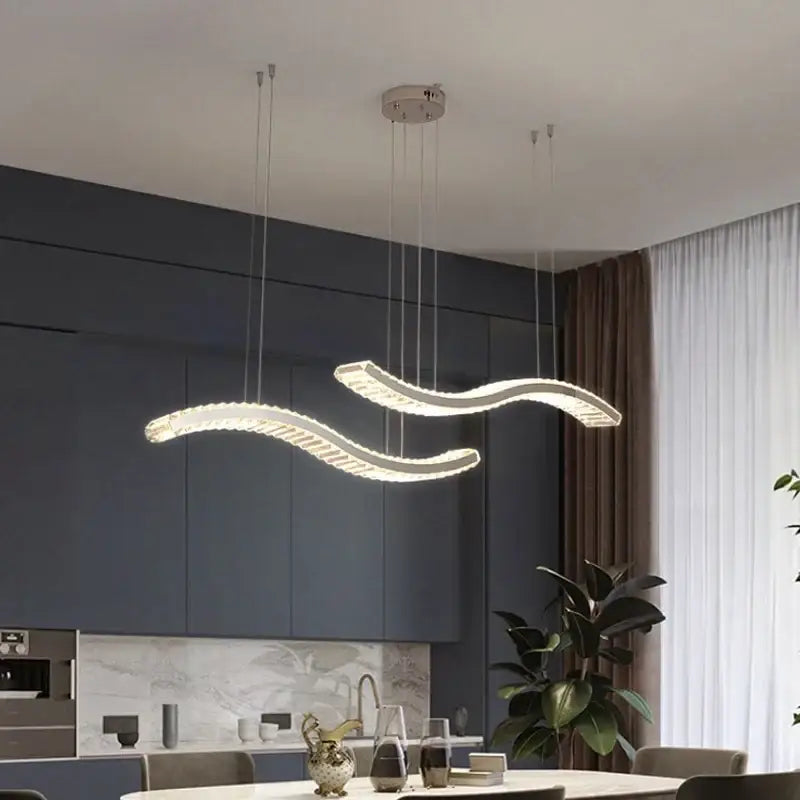 Modern interlocking decorbites crystal led ceiling chandelier with silver wavy pendant light and multiple hanging cords