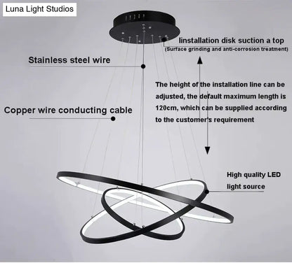 Modern black circular led pendant lights with sleek interlocking rings and stainless steel wire for dining room