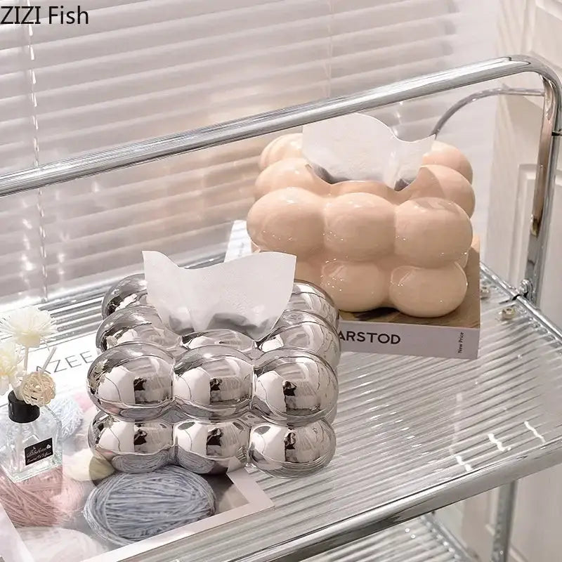 Shiny silver tissue box with bubble-like segments for modern iridescent blue and cream cotton candy ceramic decorbites
