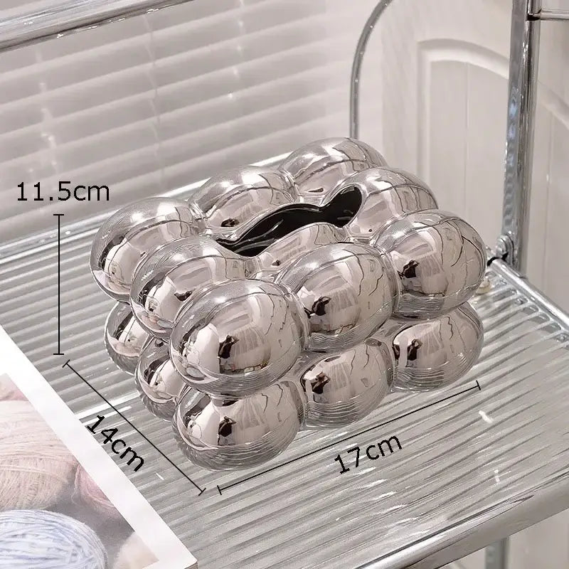Shiny silver metallic tissue box with bubble design complementing modern iridescent cotton candy ceramic decorbites bedroom decor