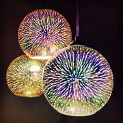 Iridescent spherical glass pendant lights with colorful 3d panels and starburst design for modern dining rooms