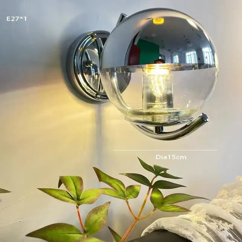Chrome finished spherical wall sconce with clear glass globe and exposed filament bulb perfect for pendant light decorbites colorful glass ball