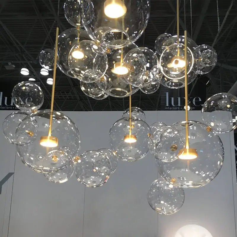 Modern iridescent colorful glass ball pendant light with clear glass bubbles and gold-toned decorbites colorful glass accents
