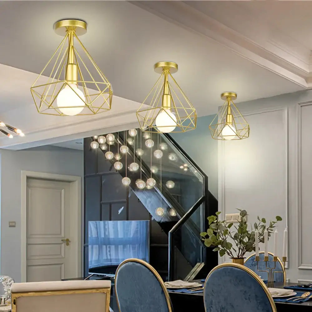 Modern iron cage ceiling lamp with gold geometric cage and exposed bulbs ideal for kitchen decorbites iron cage