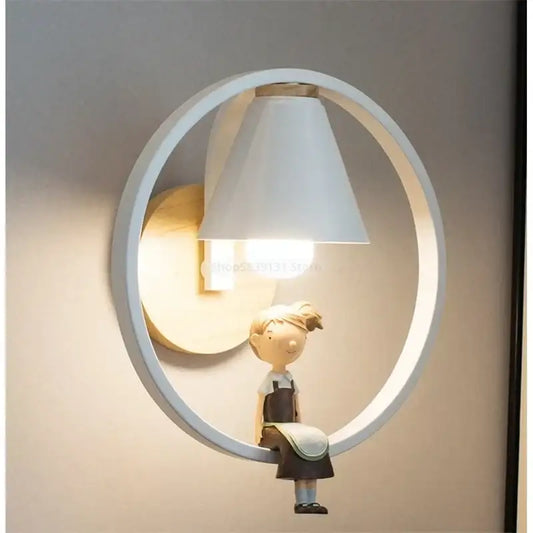 Modern iron led wall lamp in white with a child figurine in overalls sitting on the iron led wall decorbites frame