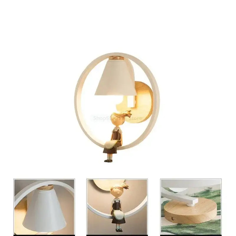 A charming white circular iron led wall lamp with a child figurine and beige shade for bedroom decorbites wall lamps