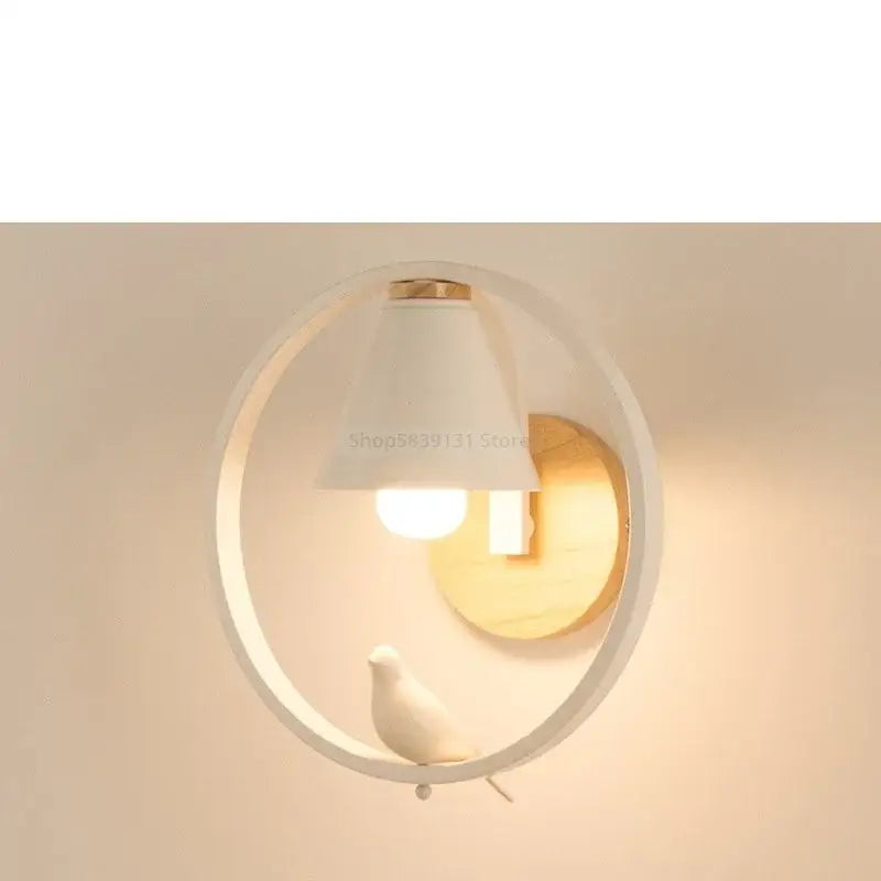 Modern iron led wall lamp with white circular sconce wooden backplate and small white bird figurine for bedroom decorbites iron led